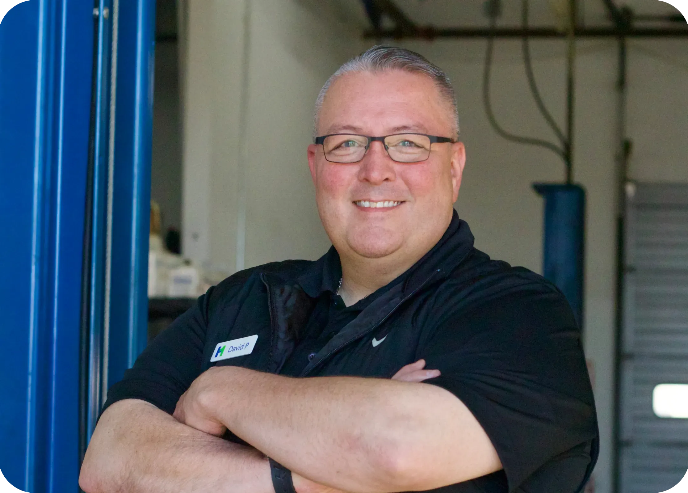David P., Honest1 Federal Heights team member, smiling in the service bay